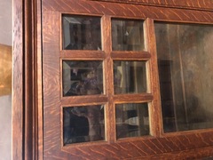 Six individual beveled glass panes in each door.  